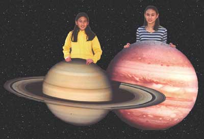 Girls with Saturn and Jupiter cutouts