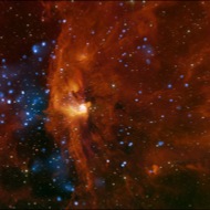 RCW 108: Stars are forming in this cloud of gas and dust called RCW 108, in our own Milky Way Galaxy. This picture combines X-ray (in blue) and infrared (red and orange) images.