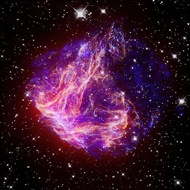 N49: This supernova remnant called N49 looks like a pink and purple flame. This image combines X-ray data from the Chandra X-ray Observatory and infrared light from Spitzer.