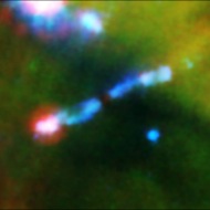 Blue blobs: In blue is hydrogen heated by jets of hot gas blasting out of a star (cloaked in dust and not visible). The jet of gas is ramming into a wall of material, shown as pink.