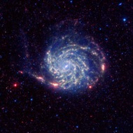 Pinwheel:  The Pinwheel Galaxy, M101, as Spitzer sees it in infrared light. It is 27 million light-years away in the constellation Ursa Major.
