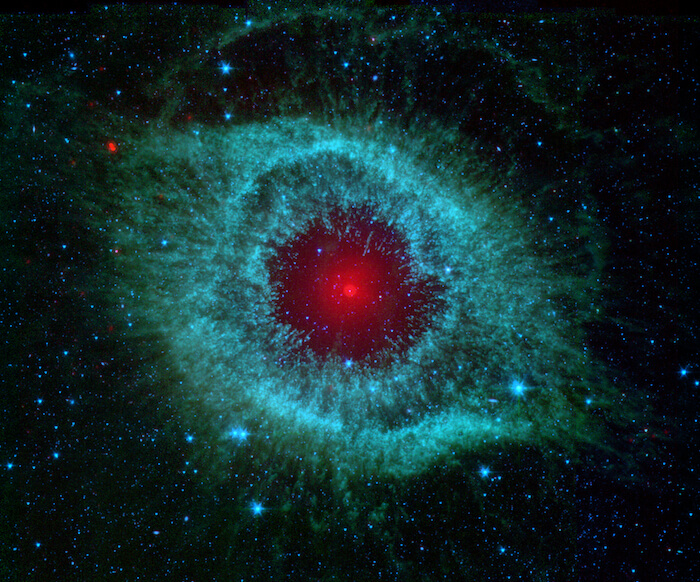 A red and blue image of the Helix Nebula.