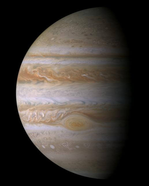 An image of Jupiter, showing the great red storm.