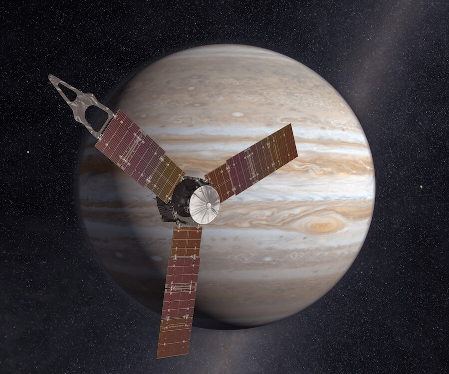 An artist's concept of the Juno spacecraft in front of Jupiter.