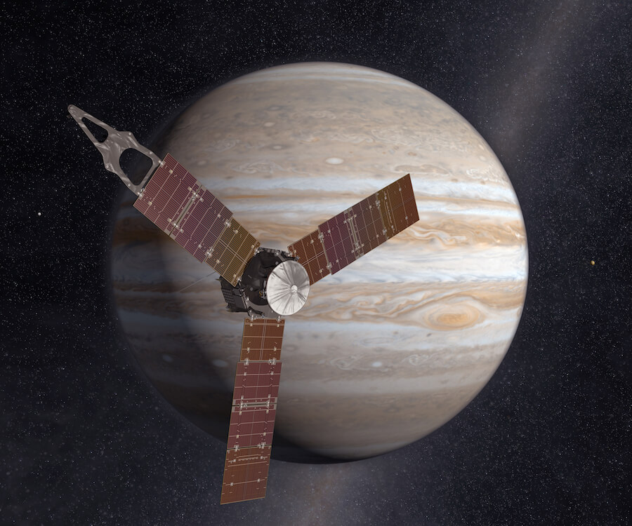 Um conceito artístico da nave espacial Juno em frente de Júpiter.'s concept of the Juno spacecraft in front of Jupiter.