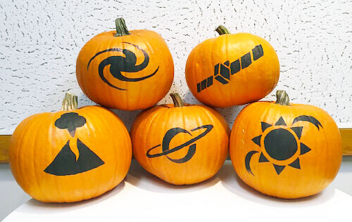 a picture of all the pumpkin designs: a galaxy, volcano, spacecraft, saturn, and sun