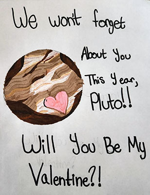 This valentine says, We won't forget about you this year, Pluto!! Will you be my Valentine?! in black lettering. On the left side of the valentine is a drawing of Pluto, colored different shades of brown. A pink heart is drawn on the bottom of the planet.