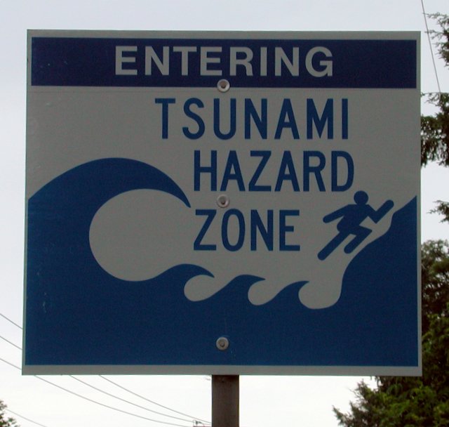 A sign that reads 'entering tsunami hazard zone.'