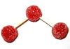 Modelo de una molécula de ozono fabricado con pastillas de goma, compuesta por tres átomos de oxígeno.