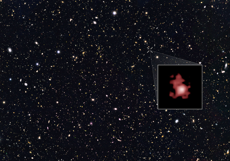 Picture of hundreds of galaxies with one shown zoomed in to see greater detail. The zoomed in part looks like a red blob.