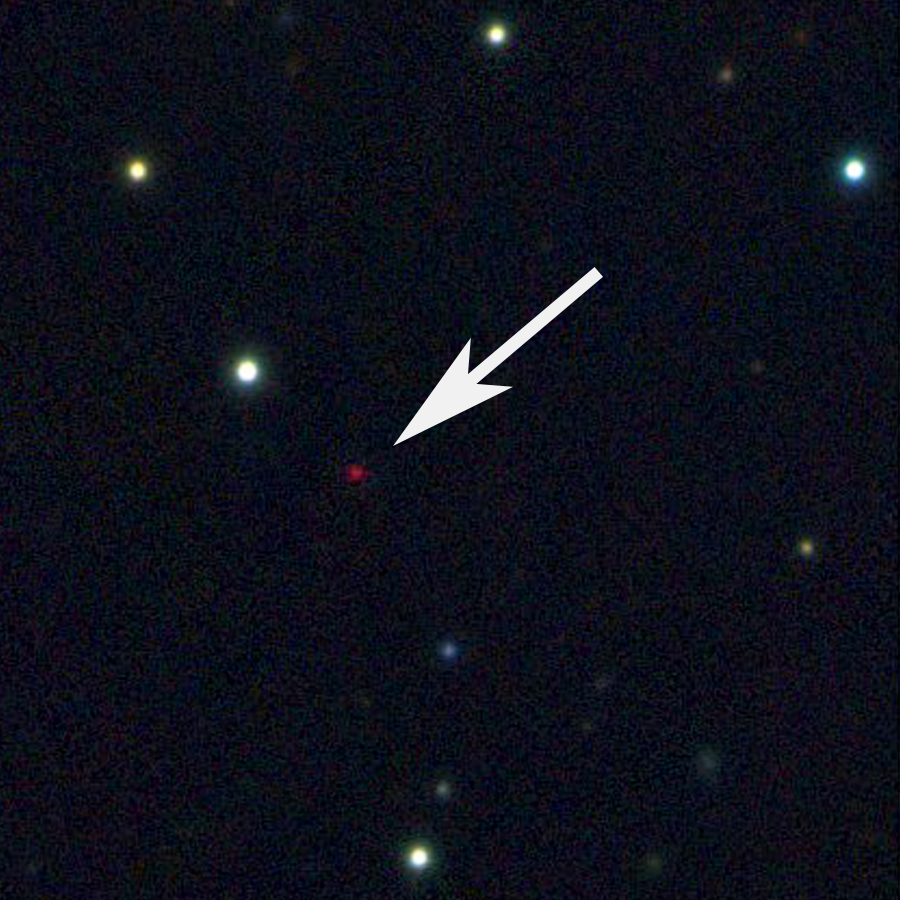 Imagen del planeta solitario a través de un telescopio, con una flecha que lo señala.