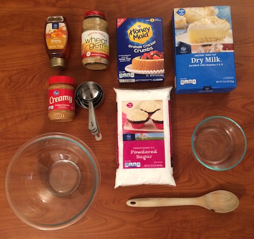 ingredients for cookies displayed on a woodgrain tabletop.