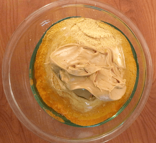 cookie ingredients in a clear glass bowl.