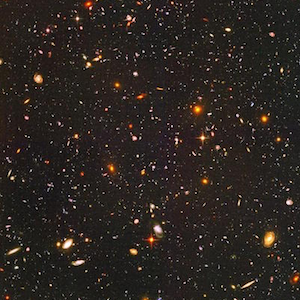 Picture taken by the Hubble Space Telescope showing thousands of galaxies.